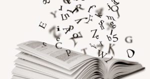 Imagem de um livro com muitas letras representanto o glossário de SEO